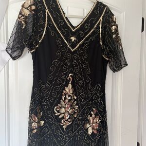 Elegant Black and Gold Embellished Dress. Roaring 70s.